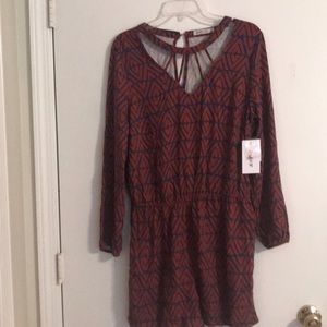 Long sleeve romper with open back new with tags